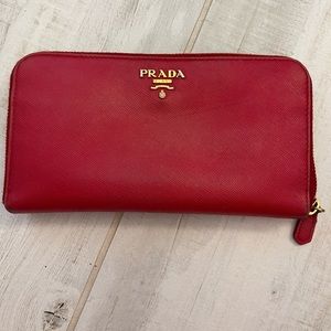 Red large zip around Prada wallet